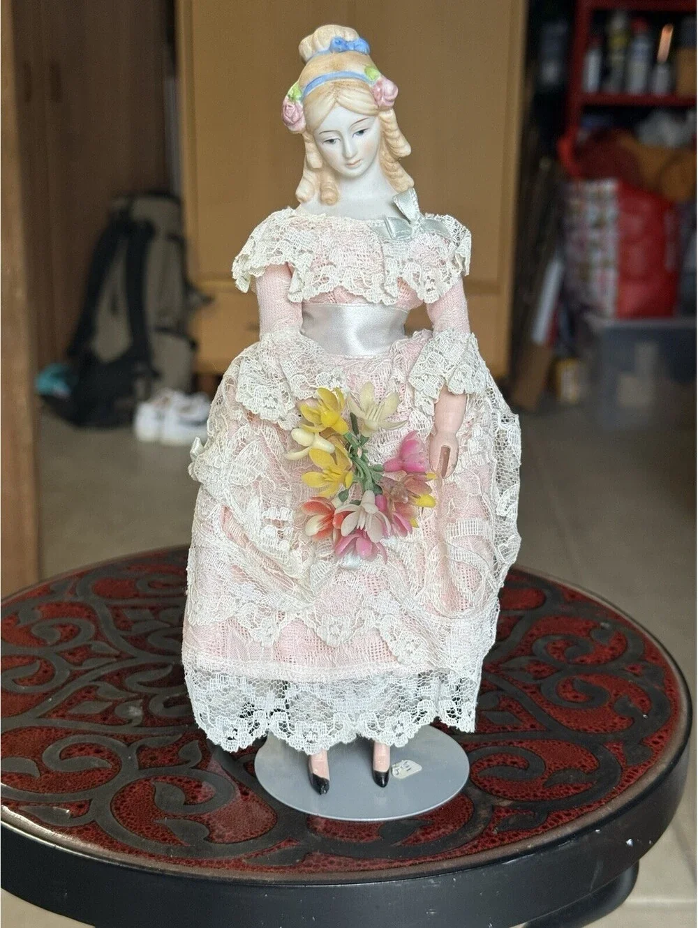 vtg porcelain doll Holding Flowers With Stand